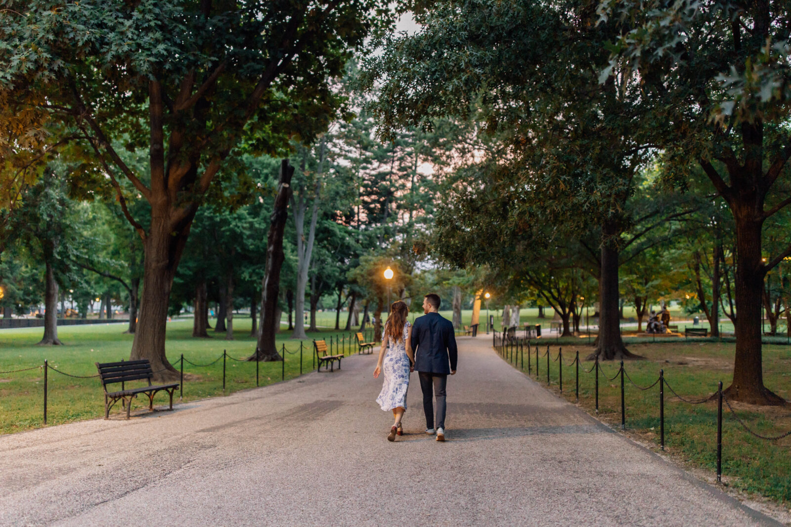 Romantic walk in the park during Washington D.C. Engagement Photo Session. True to color, cinematic photography
